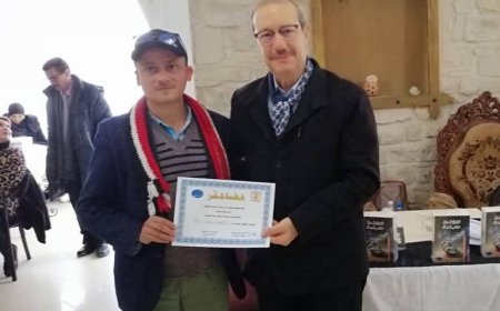 عميدُ كليّة الآدابِ والعلومِ الإنسانيّةِ بجامعةِ تونسَ يُكرّم القحويّ ومحمود أبوبكر